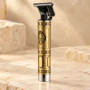 Акумуляторний тример Hair Clipper WS-T99, золотистий «Будда» — 5080 — товар у тематичній композиції
