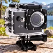 Камера D600 у захисному боксі на столі під час подорожі